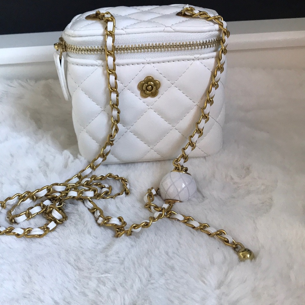 Vegan white crossbody bag. Unbranded designer inspired bag